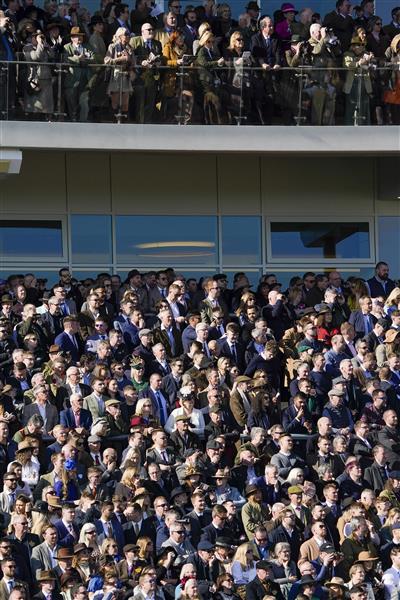 CHELTENHAM, ENGLAND - MARCH 18: Racegoers on day four of The Festival at Cheltenham Racecourse on March 18, 2022 in Cheltenham, England. (Photo by Alan Crowhurst/Getty Images)
