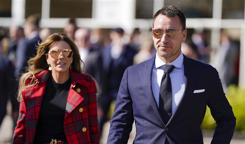 CHELTENHAM, ENGLAND - MARCH 18: Footballer John Terry with his wife Toni on day four of The Festival at Cheltenham Racecourse on March 18, 2022 in Cheltenham, England. (Photo by Alan Crowhurst/Getty Images)