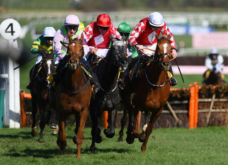 CHELTENHAM, ENGLAND - MARCH 18: Paul Townend on Vauban (L, pink kit) approach the finish line before Jack Kennedy (R, white cap) on Pied Piper to win The JCB Triumph Hurdle race during day four of the Cheltenham Festival 2022 at Cheltenham Racecourse on March 18, 2022 in Cheltenham, England. (Photo by Mike Hewitt/Getty Images)