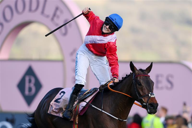 CHELTENHAM, ENGLAND - MARCH 18: Rachael Blackmore on A Plus Tard celebrates winning The Boodles Cheltenham Gold Cup Chase race during day four of the Cheltenham Festival 2022 at Cheltenham Racecourse on March 18, 2022 in Cheltenham, England. (Photo by Mike Hewitt/Getty Images)