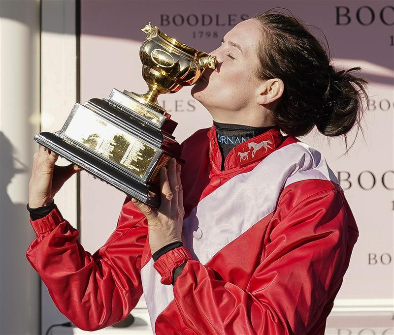 CHELTENHAM, ENGLAND - MARCH 18: Rachael Blackmore kisses the Gold Cup after riding A Plus Tard to win The Boodles Cheltenham Gold Cup Chase on day four of The Festival at Cheltenham Racecourse on March 18, 2022 in Cheltenham, England. (Photo by Alan Crowhurst/Getty Images)
