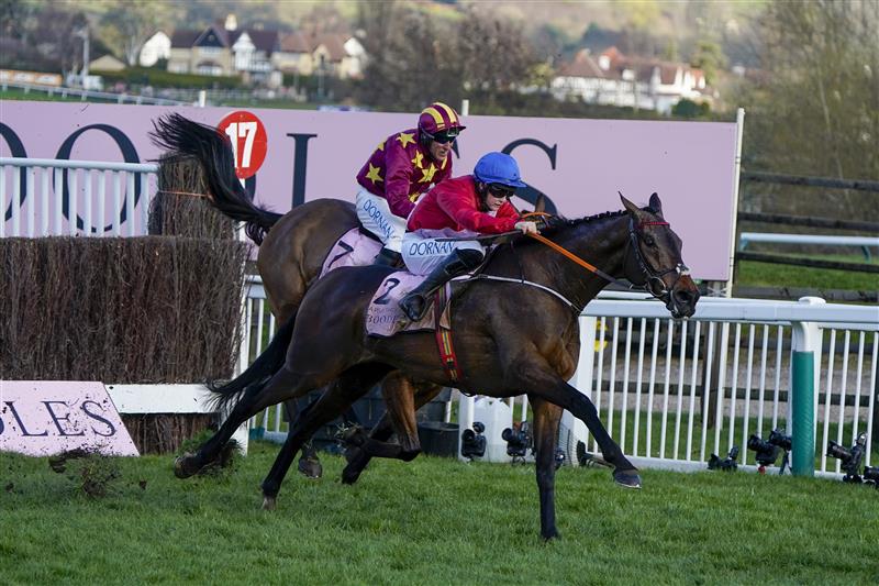 CHELTENHAM, ENGLAND - MARCH 18: Rachael Blackmore riding A Plus Tard (red) clear the last to win The Boodles Cheltenham Gold Cup Chase on day four of The Festival at Cheltenham Racecourse on March 18, 2022 in Cheltenham, England. (Photo by Alan Crowhurst/Getty Images)