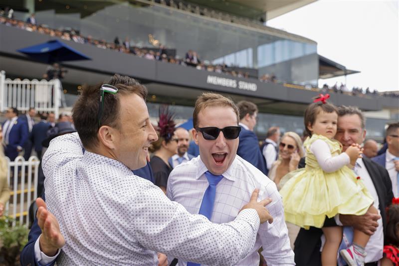 SYDNEY, AUSTRALIA - MARCH 19: Winning connections of  Forbidden Love cheer after race 7 The Agency George Ryder Stakes during Sydney Racing Longines Golden Slipper Day, at Rosehill Gardens on March 19, 2022 in Sydney, Australia. (Photo by Jenny Evans/Getty Images)