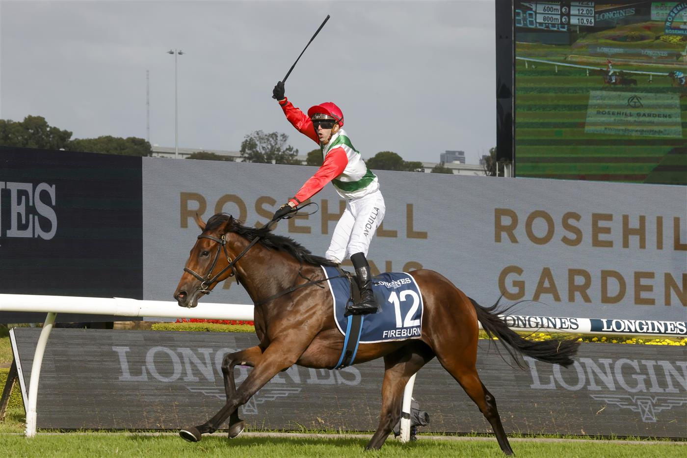 SYDNEY, AUSTRALIA - MARCH 19: Brenton Avdulla on Fireburn wins race 8 the Longines Golden Slipper during Sydney Racing Longines Golden Slipper Day, at Rosehill Gardens on March 19, 2022 in Sydney, Australia. (Photo by Jenny Evans/Getty Images)