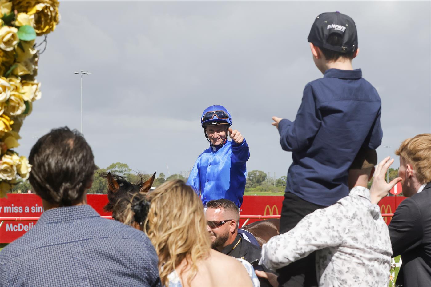 SYDNEY, AUSTRALIA - MARCH 19: James McDonald on Anamoe points to the crowd after winning race 6 the Sky Racing Active Rosehill Guineas during Sydney Racing Longines Golden Slipper Day, at Rosehill Gardens on March 19, 2022 in Sydney, Australia. (Photo by Jenny Evans/Getty Images)