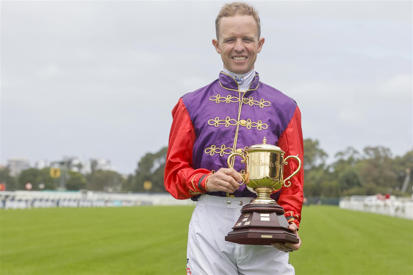 SYDNEY, AUSTRALIA - MARCH 19: Kerrin McEvoy holds the Queen's Cup during Sydney Racing Longines Golden Slipper Day, at Rosehill Gardens on March 19, 2022 in Sydney, Australia. (Getty)