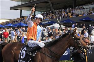 SYDNEY, AUSTRALIA - MARCH 19: Jason Collett on Montefilia returns to scale after winning race 5 the Ranvet Stakes during Sydney Racing Longines Golden Slipper Day, at Rosehill Gardens on March 19, 2022 in Sydney, Australia. (Photo by Mark Evans/Getty Images)