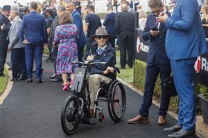 SYDNEY, AUSTRALIA - MARCH 19: Jockey manager and ex jockey Tye Angland looks on during Sydney Racing Longines Golden Slipper Day, at Rosehill Gardens on March 19, 2022 in Sydney, Australia. (Photo by Jenny Evans/Getty Images)
