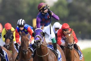 SYDNEY, AUSTRALIA - MARCH 19: Robbie Dolan on Shelby SixtySix wins race 9 the Furphy Galaxy during Sydney Racing Longines Golden Slipper Day, at Rosehill Gardens on March 19, 2022 in Sydney, Australia. (Photo by Mark Evans/Getty Images)