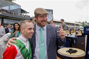 SYDNEY, AUSTRALIA - MARCH 19: Trainer Gary Portelli and Brenton Avdulla celebrate winning race 8 the Longines Golden Slipper with Fireburn during Sydney Racing Longines Golden Slipper Day, at Rosehill Gardens on March 19, 2022 in Sydney, Australia. (Photo by Jenny Evans/Getty Images)