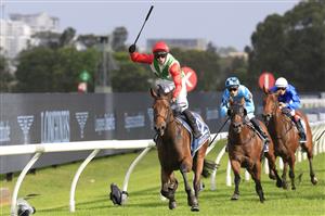 SYDNEY, AUSTRALIA - MARCH 19: Brenton Avdulla on Fireburn
wins race 8 the Longines Golden Slipperduring Sydney Racing Longines Golden Slipper Day, at Rosehill Gardens on March 19, 2022 in Sydney, Australia. (Photo by Mark Evans/Getty Images)