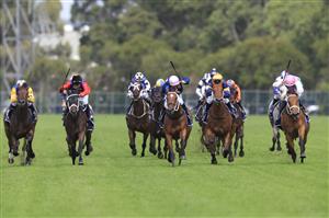 SYDNEY, AUSTRALIA - MARCH 19: Jay Ford on No Compromise wins race 3 the Queen’s Cup during Sydney Racing Longines Golden Slipper Day, at Rosehill Gardens on March 19, 2022 in Sydney, Australia. (Photo by Mark Evans/Getty Images)