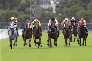 SYDNEY, AUSTRALIA - MARCH 19: Robbie Dolan on Achira wins race 1 the Midway Handicap during Sydney Racing Longines Golden Slipper Day, at Rosehill Gardens on March 19, 2022 in Sydney, Australia. (Photo by Mark Evans/Getty Images)