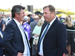 MELBOURNE, AUSTRALIA - MARCH 19: Trainer Robert Hickmott and owner Nick Williams are seen after Pondus won Race 8, the The Seppelt Wines Regal Power, during All-Star Mile Race day at Flemington Racecourse on March 19, 2022 in Melbourne, Australia. (Photo by Vince Caligiuri/Getty Images)