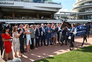 MELBOURNE, AUSTRALIA - MARCH 19: Zaaki poses with connections after winning Race 6, the The Seppelt Wines All-star Mile, during All-Star Mile Race day at Flemington Racecourse on March 19, 2022 in Melbourne, Australia. (Photo by Vince Caligiuri/Getty Images)