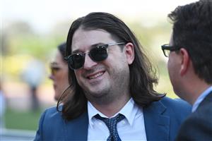 MELBOURNE, AUSTRALIA - MARCH 19: Matthew Gudinski is seen after Pondus won Race 8, the The Seppelt Wines Regal Power, during All-Star Mile Race day at Flemington Racecourse on March 19, 2022 in Melbourne, Australia. (Photo by Vince Caligiuri/Getty Images)