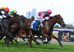 MELBOURNE, AUSTRALIA - MARCH 19: Harry Coffey riding Glassey Miss winning Race 5, the Furphy Country Mile Series Final, during All-Star Mile Race day at Flemington Racecourse on March 19, 2022 in Melbourne, Australia. (Photo by Vince Caligiuri/Getty Images)
