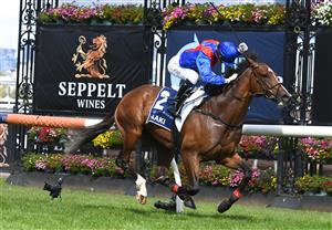 MELBOURNE, AUSTRALIA - MARCH 19: Jamie Kah riding Zaaki winning Race 6, the The Seppelt Wines All-star Mile, during All-Star Mile Race day at Flemington Racecourse on March 19, 2022 in Melbourne, Australia. (Photo by Vince Caligiuri/Getty Images)