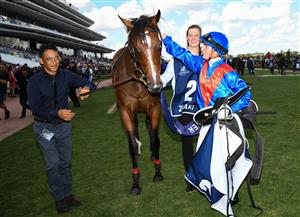MELBOURNE, AUSTRALIA - MARCH 19: Jamie Kah poses after riding Zaaki to win Race 6, the The Seppelt Wines All-star Mile, during All-Star Mile Race day at Flemington Racecourse on March 19, 2022 in Melbourne, Australia. (Photo by Vince Caligiuri/Getty Images)