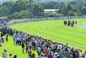 MELBOURNE, AUSTRALIA - MARCH 26: Damien Oliver riding Rousseau turns into home straight before winning Race 5, the Surdex Sheet And Coil Handicap, during Mornington Cup Day at Mornington Racecourse on March 26, 2022 in Melbourne, Australia. (Photo by Vince Caligiuri/Getty Images)