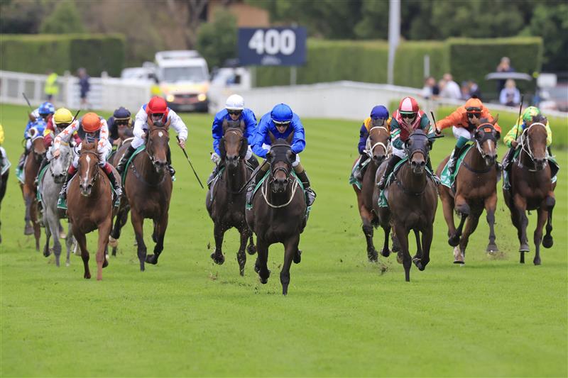 SYDNEY, AUSTRALIA - APRIL 02: Hugh Bowman on Honeycreeper wins race 3 the TAB Adrian Knox Stakes during The Star Championships Day 1 at Royal Randwick Racecourse on April 02, 2022 in Sydney, Australia. (Photo by Mark Evans/Getty Images)