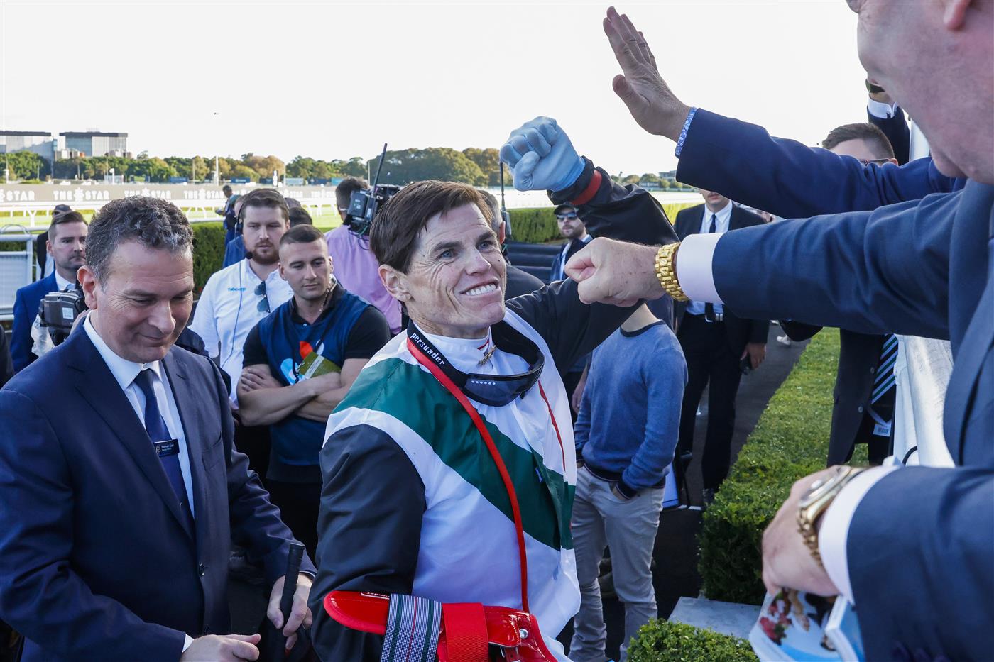 SYDNEY, AUSTRALIA - APRIL 02: Craig Williams celebrates with connections, winning race 9 the The Star Doncaster Mile on Mr Brightside during The Star Championships Day 1 at Royal Randwick Racecourse on April 02, 2022 in Sydney, Australia. (Photo by Jenny Evans/Getty Images)