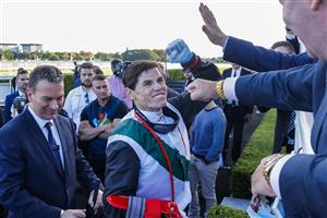 SYDNEY, AUSTRALIA - APRIL 02: Craig Williams celebrates with connections, winning race 9 the The Star Doncaster Mile on Mr Brightside during The Star Championships Day 1 at Royal Randwick Racecourse on April 02, 2022 in Sydney, Australia. (Photo by Jenny Evans/Getty Images)