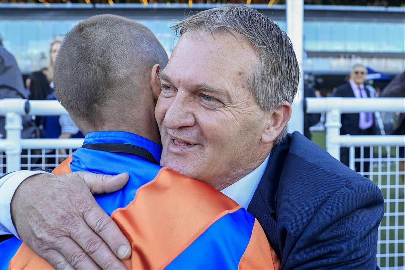 SYDNEY, AUSTRALIA - APRIL 09: Nash Rawiller hugs trainer Kerry Parker after winning race 8 the Longines Queen Elizabeth Stakes with Think It over during The Championships Day 2, Longines Queen Elizabeth Stakes Day, at Royal Randwick Racecourse on April 09, 2022 in Sydney, Australia. (Photo by Jenny Evans/Getty Images)