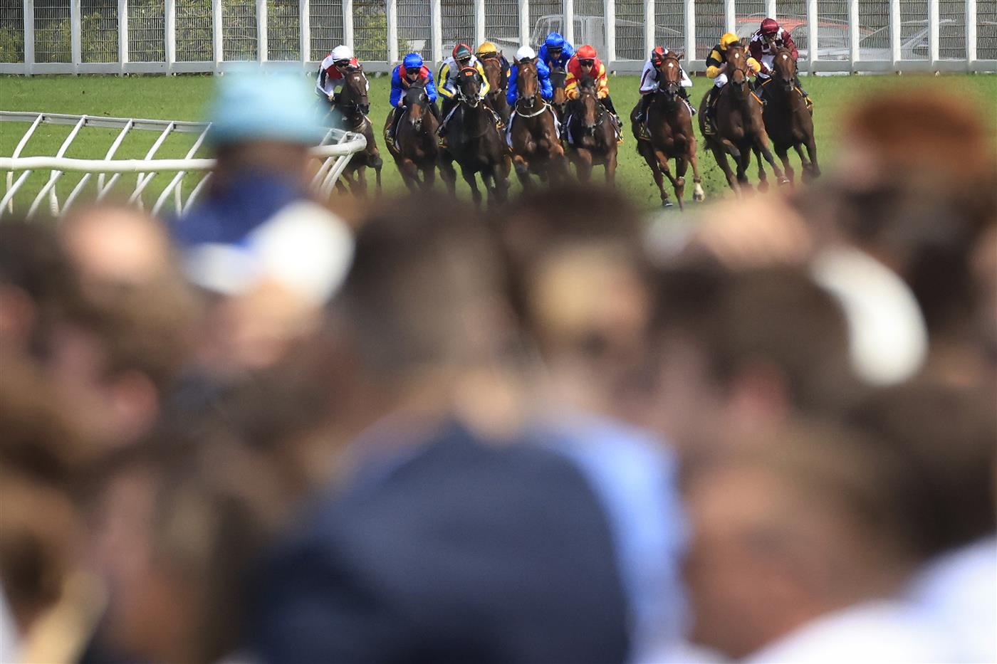 SYDNEY, AUSTRALIA - APRIL 09: Sam Clipperton on Vilana (white cap, centre) rounds the home turn to win 1race 2 the Bisley Workwear South Pacific Classic during The Championships Day 2, Longines Queen Elizabeth Stakes Day, at Royal Randwick Racecourse on April 09, 2022 in Sydney, Australia. (Photo by Mark Evans/Getty Images)