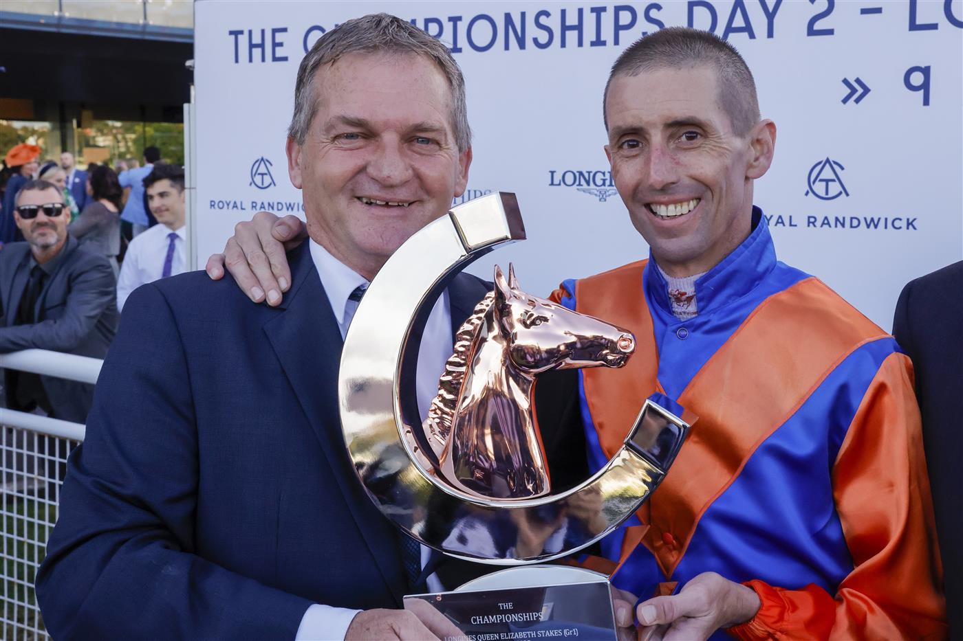 SYDNEY, AUSTRALIA - APRIL 09: Nash Rawiller and trainer Kerry Parker pose with the trophy after winning race 8 the Longines Queen Elizabeth Stakes with Think It over during The Championships Day 2, Longines Queen Elizabeth Stakes Day, at Royal Randwick Racecourse on April 09, 2022 in Sydney, Australia. (Photo by Jenny Evans/Getty Images)