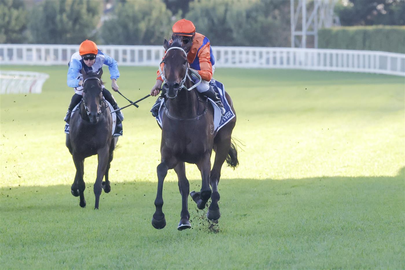 SYDNEY, AUSTRALIA - APRIL 09: Nash Rawiller (R) on Think It over wins race 8 the Longines Queen Elizabeth Stakes during The Championships Day 2, Longines Queen Elizabeth Stakes Day, at Royal Randwick Racecourse on April 09, 2022 in Sydney, Australia. (Photo by Jenny Evans/Getty Images)