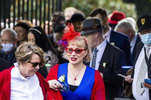 SYDNEY, AUSTRALIA - APRIL 09: People queue at the turnstiles ahead of The Championships Day 2, Longines Queen Elizabeth Stakes Day at Royal Randwick Racecourse on April 09, 2022 in Sydney, Australia. The Championships race days are the highlight of the Sydney Autumn Racing Carnival. (Photo by Jenny Evans/Getty Images)