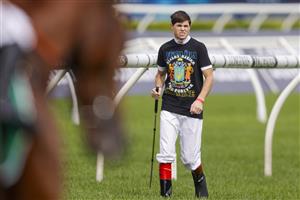 SYDNEY, AUSTRALIA - APRIL 09: Craig Williams inspects the track during The Championships Day 2, Longines Queen Elizabeth Stakes Day, at Royal Randwick Racecourse on April 09, 2022 in Sydney, Australia. (Photo by Jenny Evans/Getty Images)