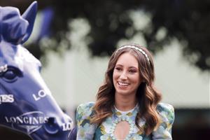 SYDNEY, AUSTRALIA - APRIL 09: Katelyn Mallyon looks at the Longines horse duringThe Championships Day 2, Longines Queen Elizabeth Stakes Day at Royal Randwick Racecourse on April 09, 2022 in Sydney, Australia. The Championships race days are the highlight of the Sydney Autumn Racing Carnival. (Photo by Jenny Evans/Getty Images)
