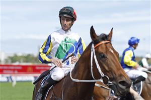 SYDNEY, AUSTRALIA - APRIL 09: Nash Rawiller on Kinloch returns to scale after winning race 3 the Polytrack Provincial-Midway Championships Final during The Championships Day 2, Longines Queen Elizabeth Stakes Day, at Royal Randwick Racecourse on April 09, 2022 in Sydney, Australia. (Photo by Mark Evans/Getty Images)
