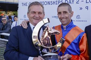 SYDNEY, AUSTRALIA - APRIL 09: Nash Rawiller and trainer Kerry Parker pose with the trophy after winning race 8 the Longines Queen Elizabeth Stakes with Think It over during The Championships Day 2, Longines Queen Elizabeth Stakes Day, at Royal Randwick Racecourse on April 09, 2022 in Sydney, Australia. (Photo by Jenny Evans/Getty Images)
