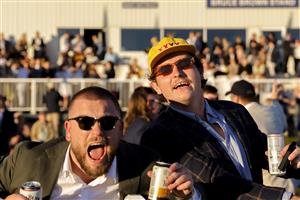 HAWKESBURY, AUSTRALIA - APRIL 30: Punters cheer after race 10 the Voir Grand Classic Bm78 Handicap during Hawkesbury Cup Day at Hawkesbury Race Club on April 30, 2022 in Hawkesbury, Australia. (Photo by Jenny Evans/Getty Images)
