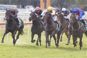 HAWKESBURY, AUSTRALIA - APRIL 30: Rachel King (blue and red) on Exotic Ruby wins race 8 the Pioneer Services Hawkesbury Crown during Hawkesbury Cup Day at Hawkesbury Race Club on April 30, 2022 in Hawkesbury, Australia. (Photo by Jenny Evans/Getty Images)