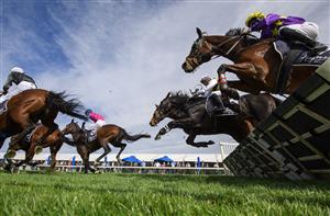 WARRNAMBOOL, AUSTRALIA - MAY 03: Aaron Kuru riding Rider In The Snow (ctr) winning Race 3, the George Taylor Memorial Maiden Hurdle, during Brierly Steeplechase day at Warrnambool Racing Club on May 03, 2022 in Warrnambool, Australia. (Photo by Vince Caligiuri/Getty Images)