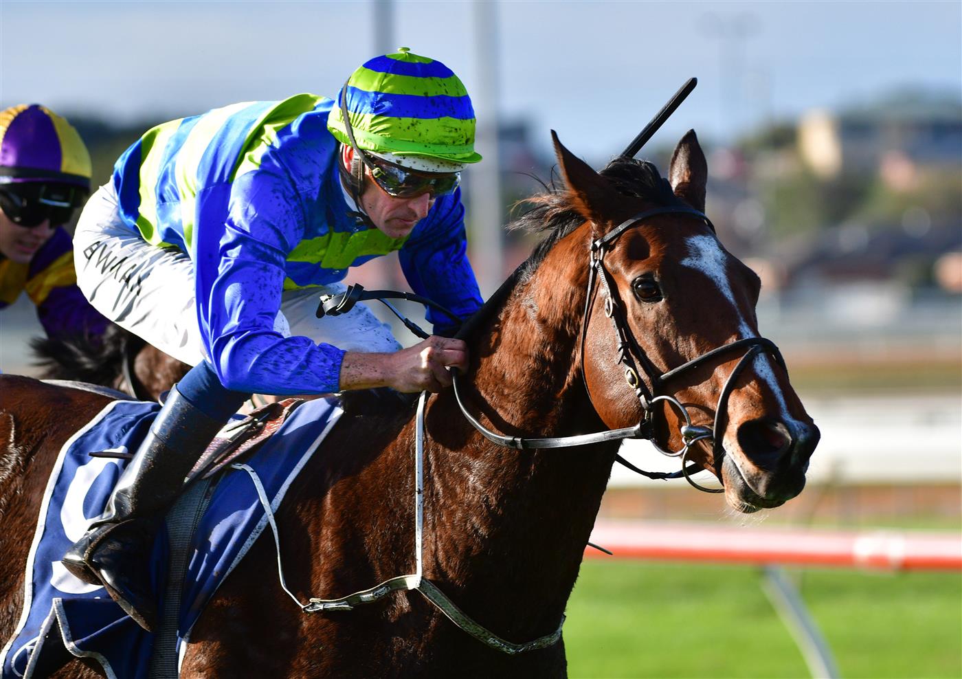 WARRNAMBOOL, AUSTRALIA - MAY 04: Hugh Bowman riding Flash Flood winning Race 9, the Prydes Easifeed Bm70 Handicap,  during Galleywood Hurdle day at Warrnambool Racing Club on May 04, 2022 in Warrnambool, Australia. (Photo by Vince Caligiuri/Getty Images)