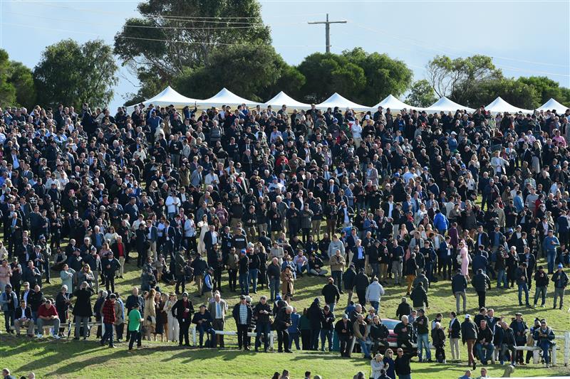 WARRNAMBOOL, AUSTRALIA - MAY 05:  General view of huge crowd on the hill before Race 7, the Lyndoch Living Grand Annual Steeplechase, during Grand Annual day at Warrnambool Racing Club on May 05, 2022 in Warrnambool, Australia. (Photo by Vince Caligiuri/Getty Images)