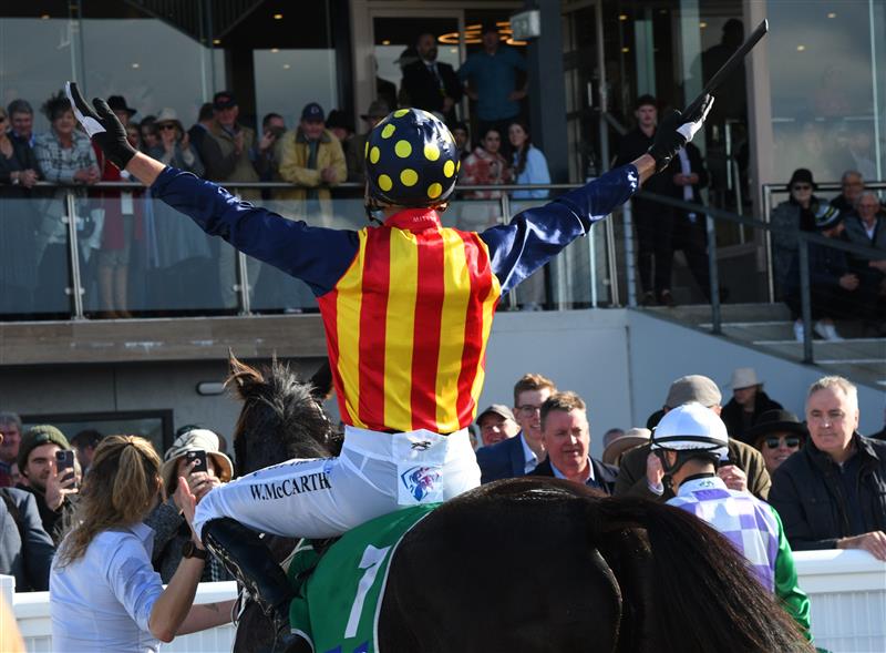 WARRNAMBOOL, AUSTRALIA - MAY 05: William McCarthy riding Heberite after winning Race 7, the Lyndoch Living Grand Annual Steeplechase, during Grand Annual day at Warrnambool Racing Club on May 05, 2022 in Warrnambool, Australia. (Photo by Vince Caligiuri/Getty Images)