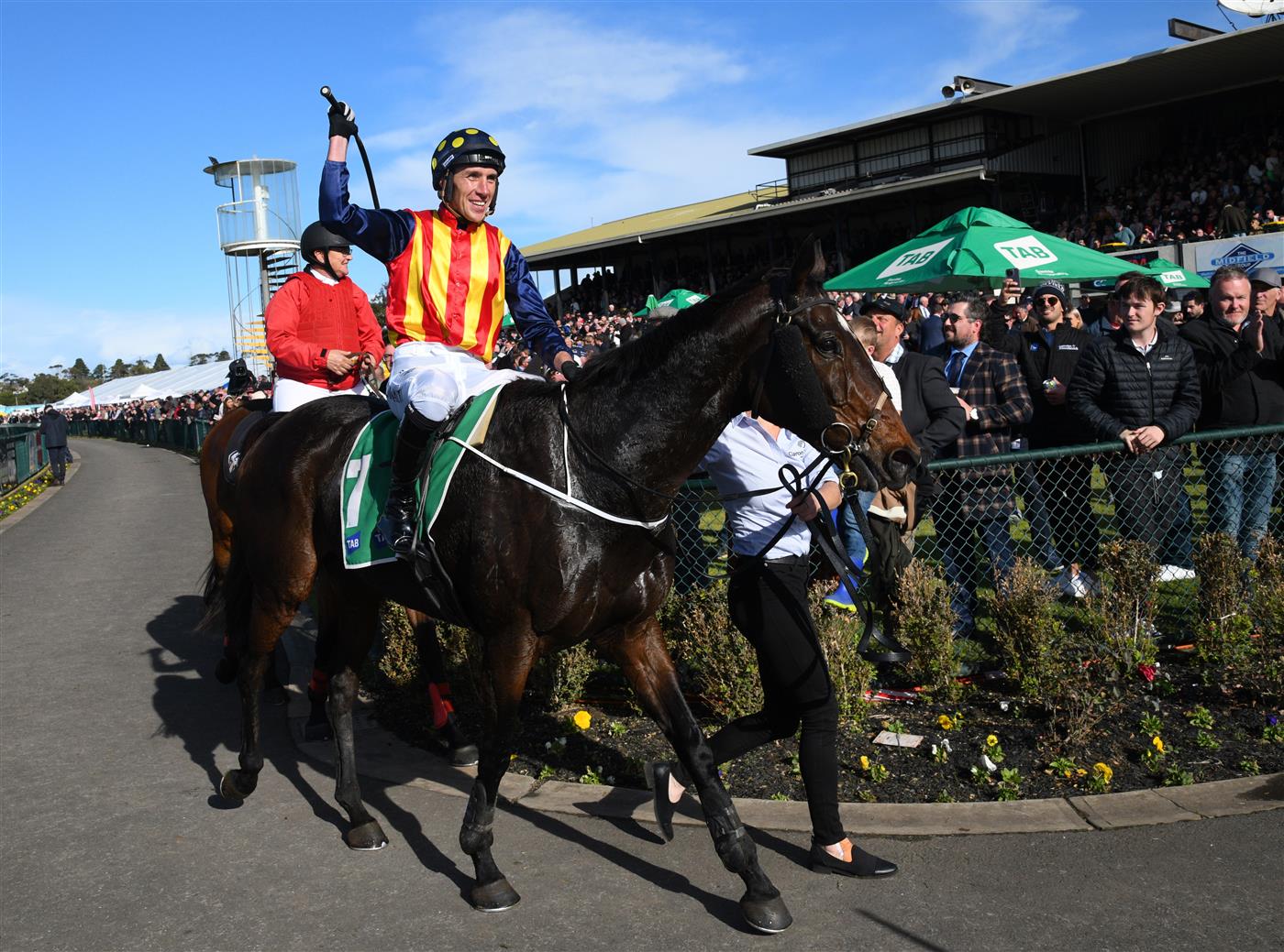 WARRNAMBOOL, AUSTRALIA - MAY 05: William McCarthy riding Heberite after winning Race 7, the Lyndoch Living Grand Annual Steeplechase, during Grand Annual day at Warrnambool Racing Club on May 05, 2022 in Warrnambool, Australia. (Photo by Vince Caligiuri/Getty Images)