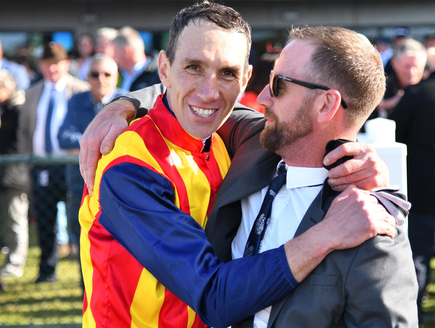 WARRNAMBOOL, AUSTRALIA - MAY 05:  William McCarthy is congratulated by Declan Maher after riding Heberite to win Race 7, the Lyndoch Living Grand Annual Steeplechase, during Grand Annual day at Warrnambool Racing Club on May 05, 2022 in Warrnambool, Australia. (Photo by Vince Caligiuri/Getty Images)