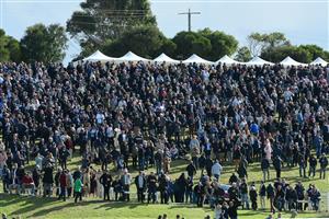 WARRNAMBOOL, AUSTRALIA - MAY 05: General view of huge crowd on the hill before Race 7, the Lyndoch Living Grand Annual Steeplechase, during Grand Annual day at Warrnambool Racing Club on May 05, 2022 in Warrnambool, Australia. (Photo by Vince Caligiuri/Getty Images)