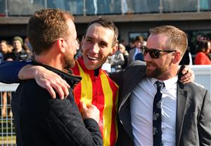 WARRNAMBOOL, AUSTRALIA - MAY 05: (L-R) Trainer Ciaron Maher, William McCarthy and Declan Maher after Heberite won Race 7, the Lyndoch Living Grand Annual Steeplechase, during Grand Annual day at Warrnambool Racing Club on May 05, 2022 in Warrnambool, Australia. (Photo by Vince Caligiuri/Getty Images)