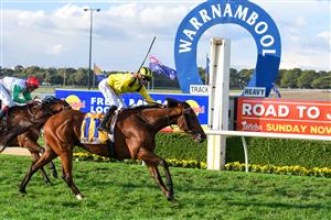 WARRNAMBOOL, AUSTRALIA - MAY 05: Beau Mertens riding Witchachar Star winning Race 9, the Sungold Milk Warrnambool Cup, during Grand Annual day at Warrnambool Racing Club on May 05, 2022 in Warrnambool, Australia. (Photo by Vince Caligiuri/Getty Images)