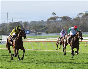 WARRNAMBOOL, AUSTRALIA - MAY 05: Beau Mertens riding Witchachar Star defeats Regan Bayliss riding Nerve Not Verve in Race 9, the Sungold Milk Warrnambool Cup, during Grand Annual day at Warrnambool Racing Club on May 05, 2022 in Warrnambool, Australia. (Photo by Vince Caligiuri/Getty Images)