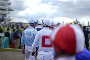 YORK, ENGLAND - MAY 11: Jockeys make their way to the paade ri at York Racecourse on May 11, 2022 in York, England. (Photo by Alan Crowhurst/Getty Images)