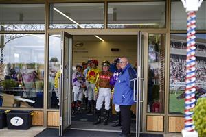 YORK, ENGLAND - MAY 11: Jockeys wait to be called to the parade ring at York Racecourse on May 11, 2022 in York, England. (Photo by Alan Crowhurst/Getty Images)